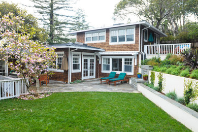 Example of an island style exterior home design in San Francisco