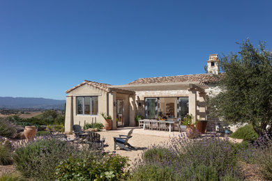 This is an example of a mediterranean house exterior in Santa Barbara.