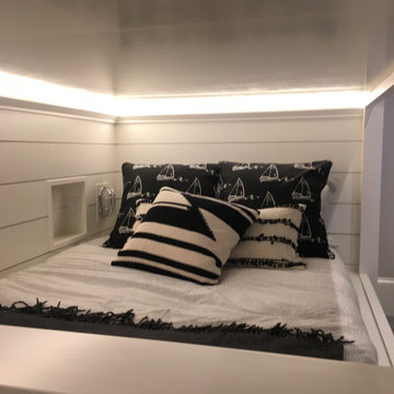 A fully equipped laundry room with a built ins