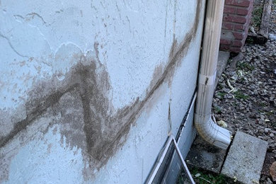 Repair of fracture in exterior wall caused by settling foundation