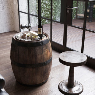 Cette image montre une grande salle de cinéma design ouverte avec un mur blanc, un sol en carrelage de céramique, un téléviseur fixé au mur et un sol marron.