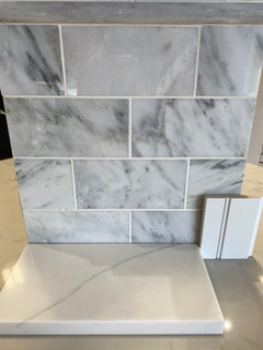 marble backsplash with Calacatta Monaco quartz countertops