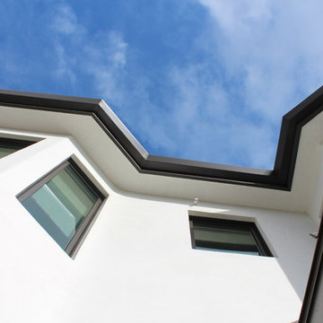 6 inch Angle Face/Flat Face Gutters with smooth Downspouts in Pacific Palisades