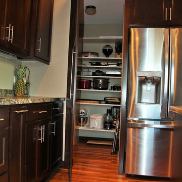 Staggered Kitchen Cabinets with Hidden Pantry