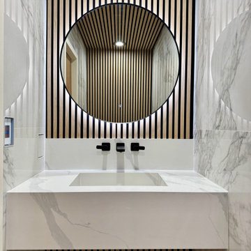 Backlit Mirror on White Oak Slat Panel