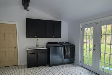 Inspiration for a large modern laundry room remodel