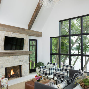 Weathered Antique Box Beams and Reclaimed Wood Mantel on Vaulted Ceiling