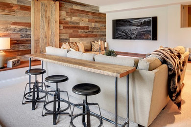 Large urban open concept carpeted and gray floor family room photo in Phoenix with gray walls, a wall-mounted tv and no fireplace