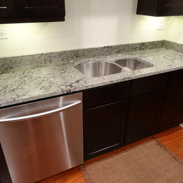 Espresso Cabinets with Romano Dream Granite Countertops