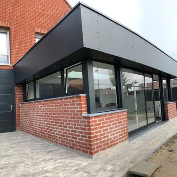 Extension design en brique - aluminium - région lilloise