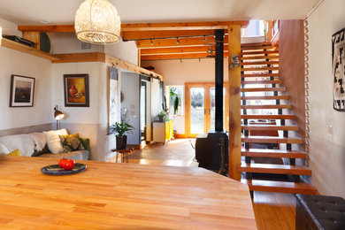 This is an example of a mid-sized eclectic home design in Other.