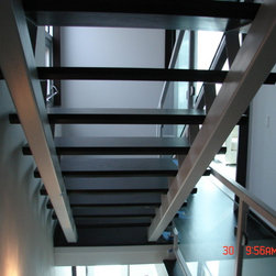 Steel stairs with glass panel - Products