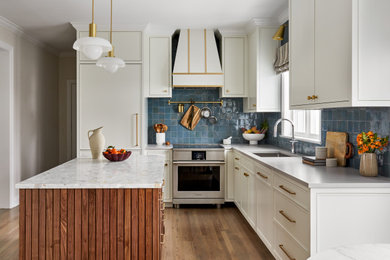 Example of a transitional kitchen design in New York