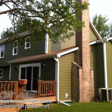 Green House with Mountain Sage James Hardie Siding & Vinyl Double Hung Windows