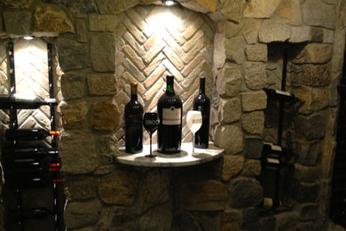Wine cellar - rustic wine cellar idea in Other