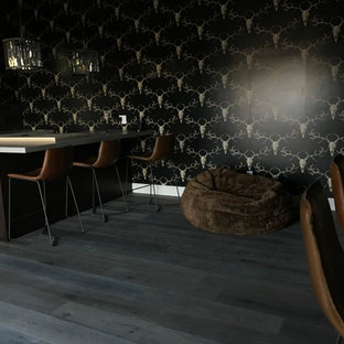 Example of a mid-sized eclectic open concept dark wood floor and brown floor home theater design in Sacramento with black walls