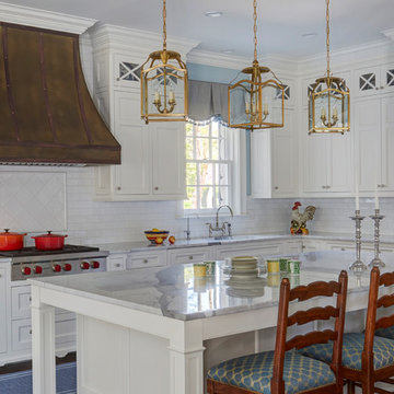 Brass Pendant Lights over Large Kitchen Island