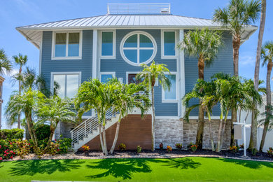 Beach style exterior home photo in Other