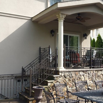 Front Entry Ways and Stairs Installation with Stone and Metal Features
