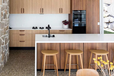This is an example of a midcentury kitchen in Brisbane.