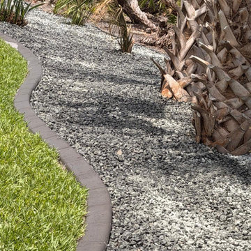 Elegant Landscape Renovation & Decorative Rock Installation