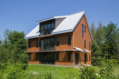 Transitional exterior home photo in Montreal