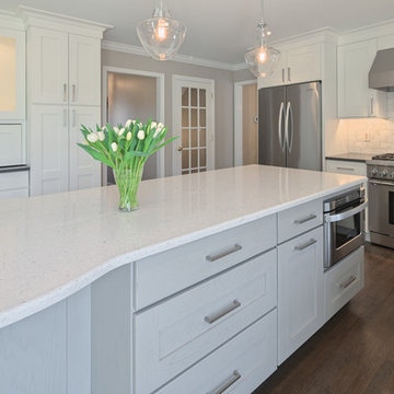Spring City -- White Kitchen Renovation with Rounded Custom Island