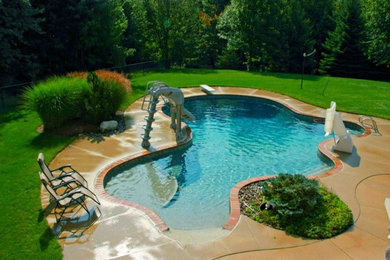 Design ideas for a traditional pool in Grand Rapids.