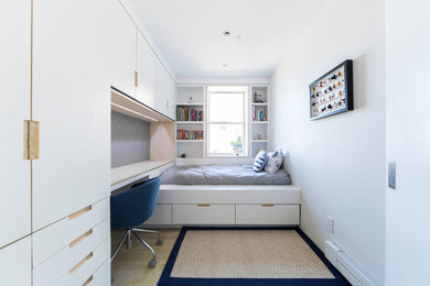 Inspiration for a mid-sized modern gender-neutral light wood floor kids' room remodel in New York with white walls