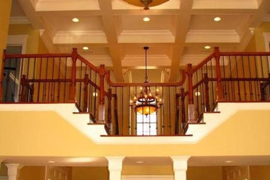 Example of a painted straight staircase design in Other
