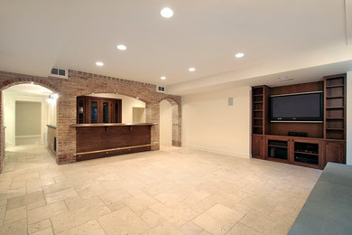 Transitional underground basement photo in Chicago with beige walls