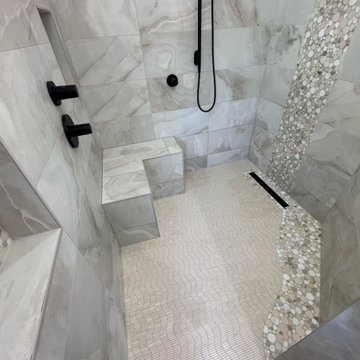 Curd-less walk-in shower; heated floors in bathroom + shower+bench LED