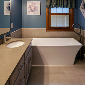 Updated Master Bath with Quartz Countertops, Freestanding Tub & Tiled Shower