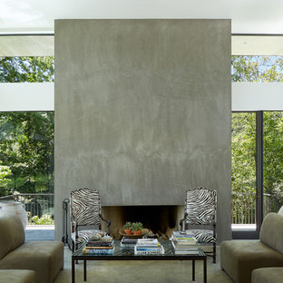 Inspiration för mellanstora moderna allrum med öppen planlösning, med ett finrum, vita väggar, betonggolv, en standard öppen spis och en spiselkrans i betong