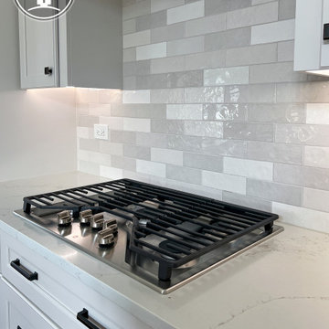 Bright & Timeless Kitchen Reorientation with Fireplace Refresh