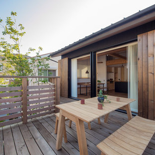 他の地域のアジアンスタイルのおしゃれなデッキ (日よけなし) の写真