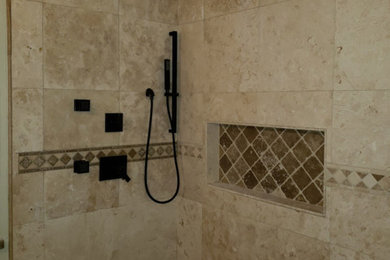 Mediterranean bathroom in Phoenix with an open shower, beige tile, ceramic tile and an open shower.