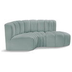 Meridian Furniture - Arc Vegan Leather Upholstered 3-Pc. S-Shaped Modular Sofa, Green - Unleash modern opulence with the Arc Vegan Leather 3pc. Sectional. Crafted for the modern connoisseur, this Sectional injects an air of refined luxury into any space. Its sleek silhouette, upholstered in supple mint green vegan leather, exudes timeless sophistication while the deep channel tufting adds textural intrigue, further elevating the chair's visual appeal. The modular design makes it a versatile chameleon, effortlessly adapting to your evolving needs and preferences. Whether you envision it gracing a chic living room corner, basking in the glow of a bedroom window, or adding a touch of drama to a home office, the Arc seamlessly complements your unique interior aesthetic.