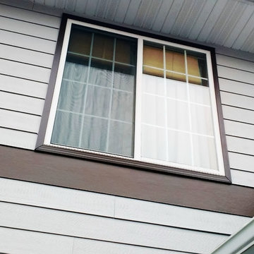 Popular Pearl Gray Hardie Plank Siding Exterior With Rich Espresso Accents