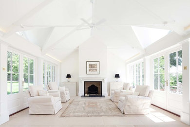 Inspiration for a large transitional formal open concept living room in Wiltshire with white walls, a standard fireplace and a brick fireplace surround.