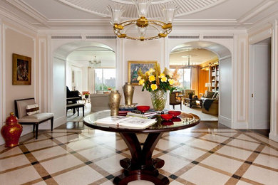 Foyer - traditional foyer idea in New York with beige walls