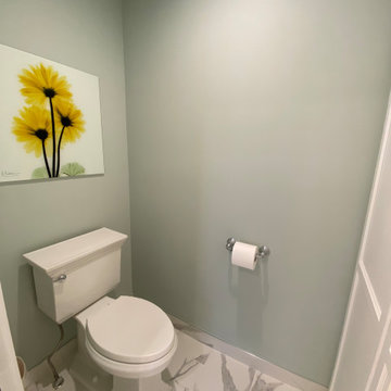 Bright and Contemporary Large Primary Bathroom with Toilet Room