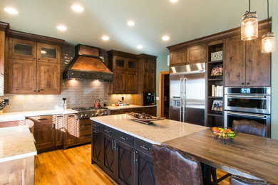 Example of a mid-sized transitional kitchen design in Denver
