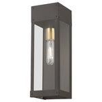 Livex Lighting - Barrett 1 Light Bronze Tall Outdoor Wall Lantern With Antique Brass Candle - Made of stainless steel this charming, bronze finish outdoor wall lantern has a versatile look that can be placed almost anywhere. The antique brass accent & clear glass adds a traditional touch to the clean, transitional-contemporary lines.