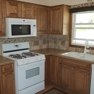 Traditional remodel done in Maple with Brown Oak Stain
