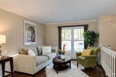 Example of a mid-sized minimalist formal and open concept dark wood floor living room design in DC Metro with beige walls