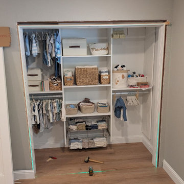 Lucia 8831 White double door with black dummy handles and magnetic catchers.