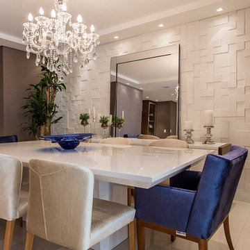 Contemporary white dining room with white cement wall panels
