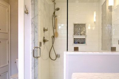 Inspiration for a mid-sized timeless master white tile and porcelain tile marble floor corner shower remodel in Burlington with an integrated sink, beaded inset cabinets, white cabinets, marble countertops, a two-piece toilet and gray walls