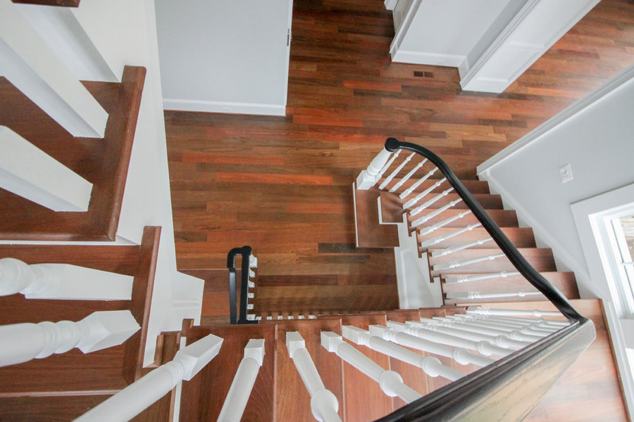 Powerful Impression by Floating Staircase in Suburban Foyer